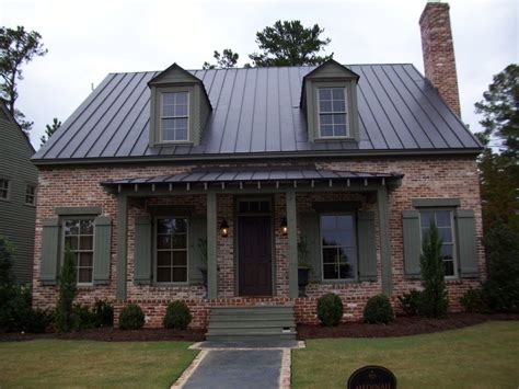 cocoa brown metal roof red brick house|brown roof house ideas.